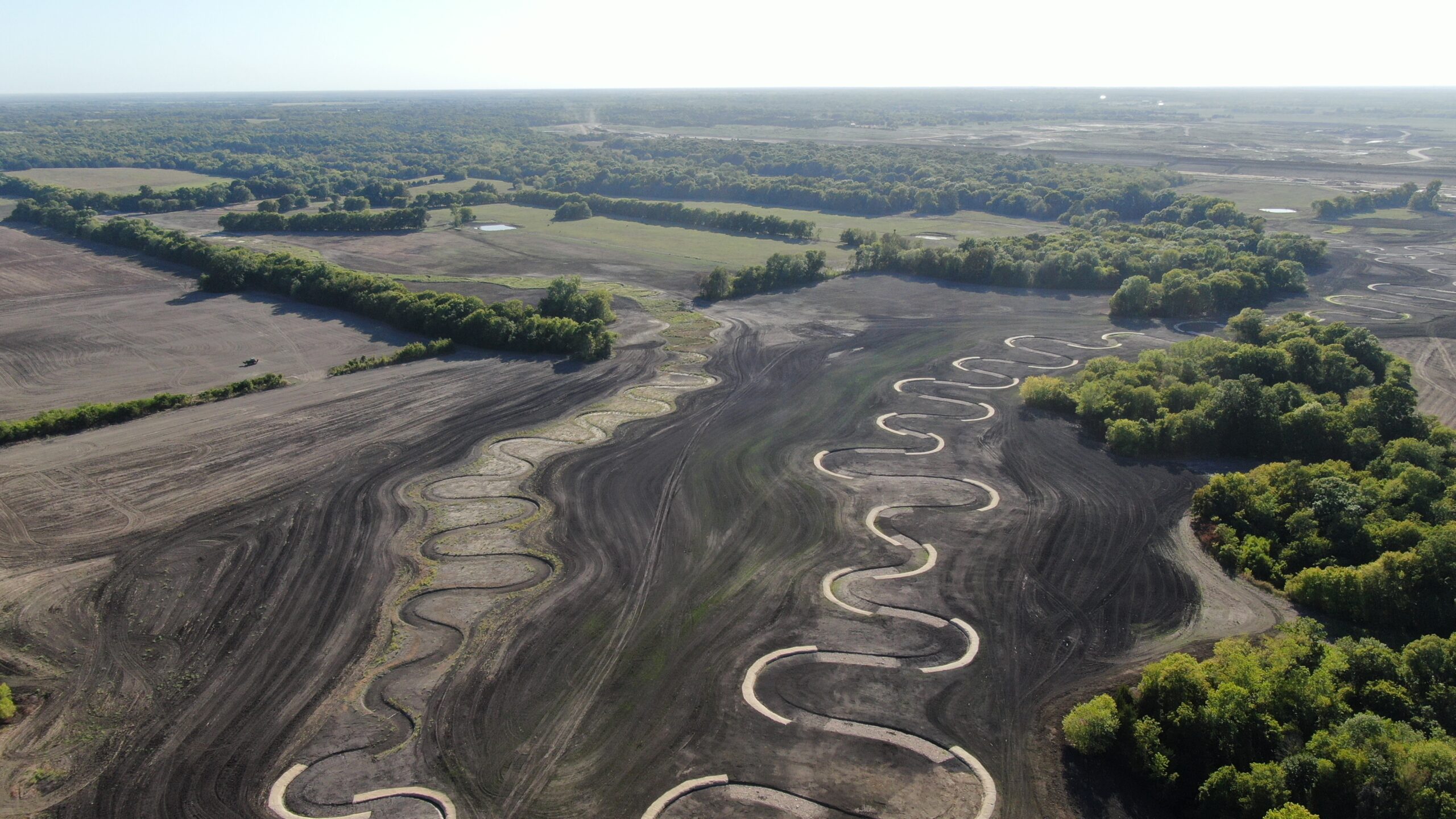 Completed Lake Ralph Hall stream mitigation, showing the restored curves of the river, supported on its bends to prevent wash-out.