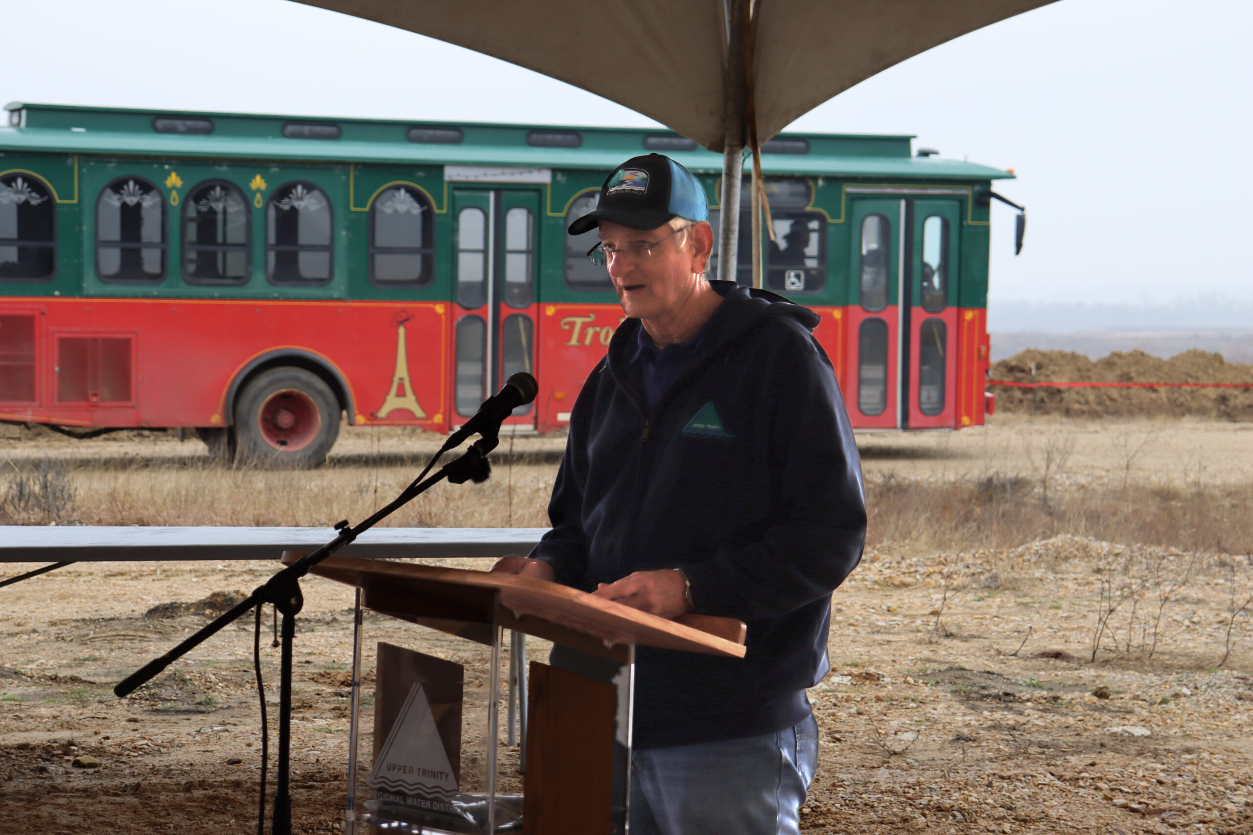 Upper Trinity Program Manager Ed Motley addresses the crowd at the commemorative last piece of pipeline event