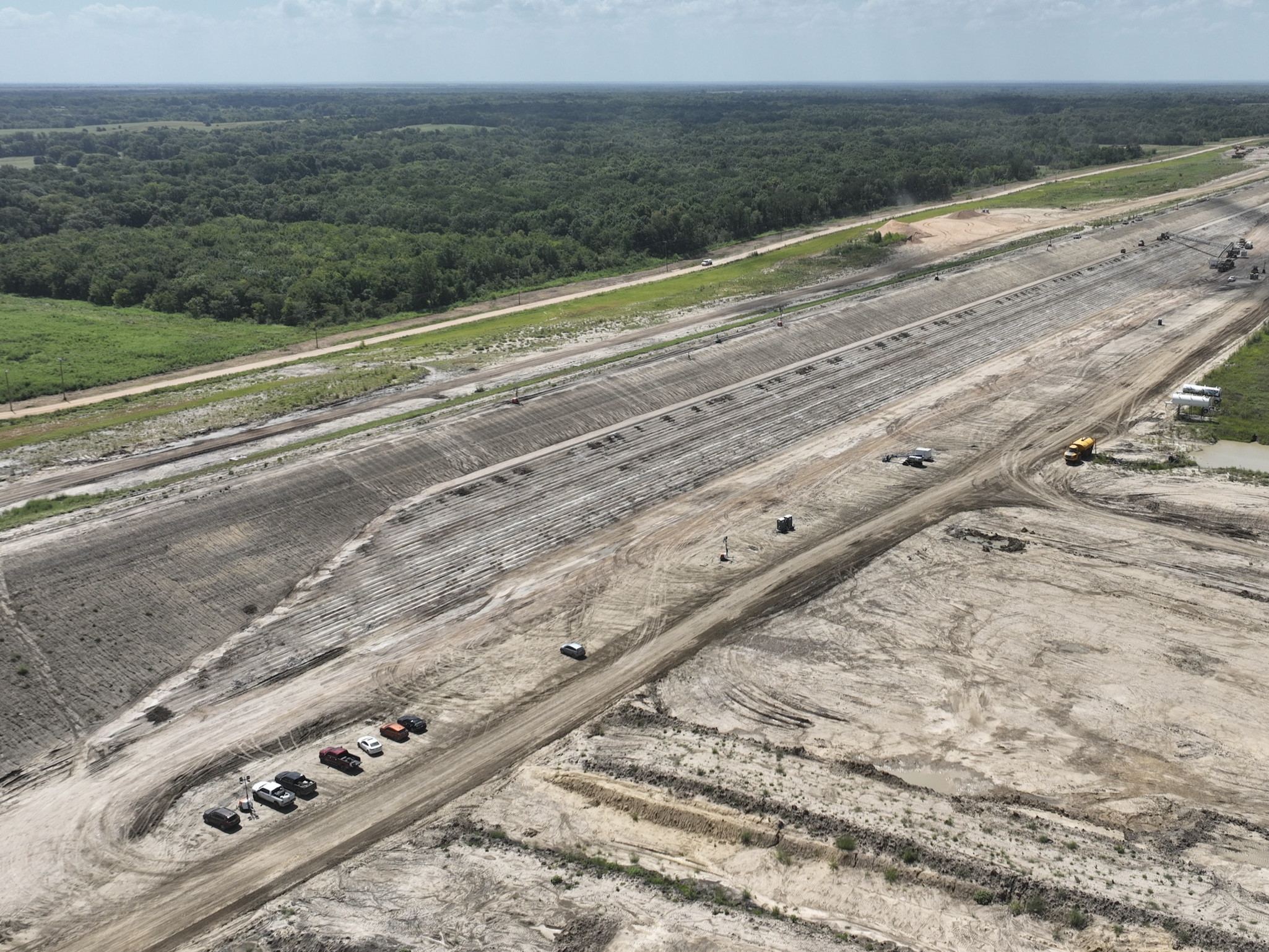 Soil cement being poured on the dam embankment fall 2025.